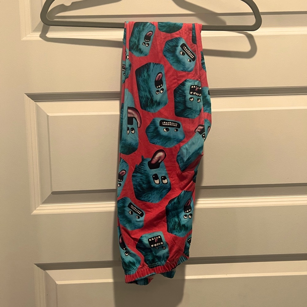 Leggings Army one size women’s leggings. Pink with blue faces.